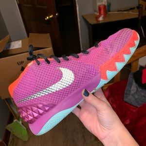purple/pink nike basketball/athletic shoes